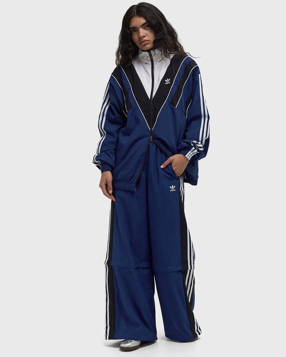 CLOTHING - Rasant Cut Line Track Pants - Blue | adidas Oman