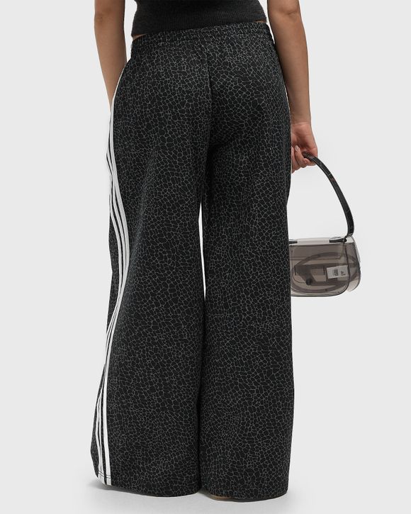 WMNS FIREBIRD OVERSIZED AOP DENIM PANTS