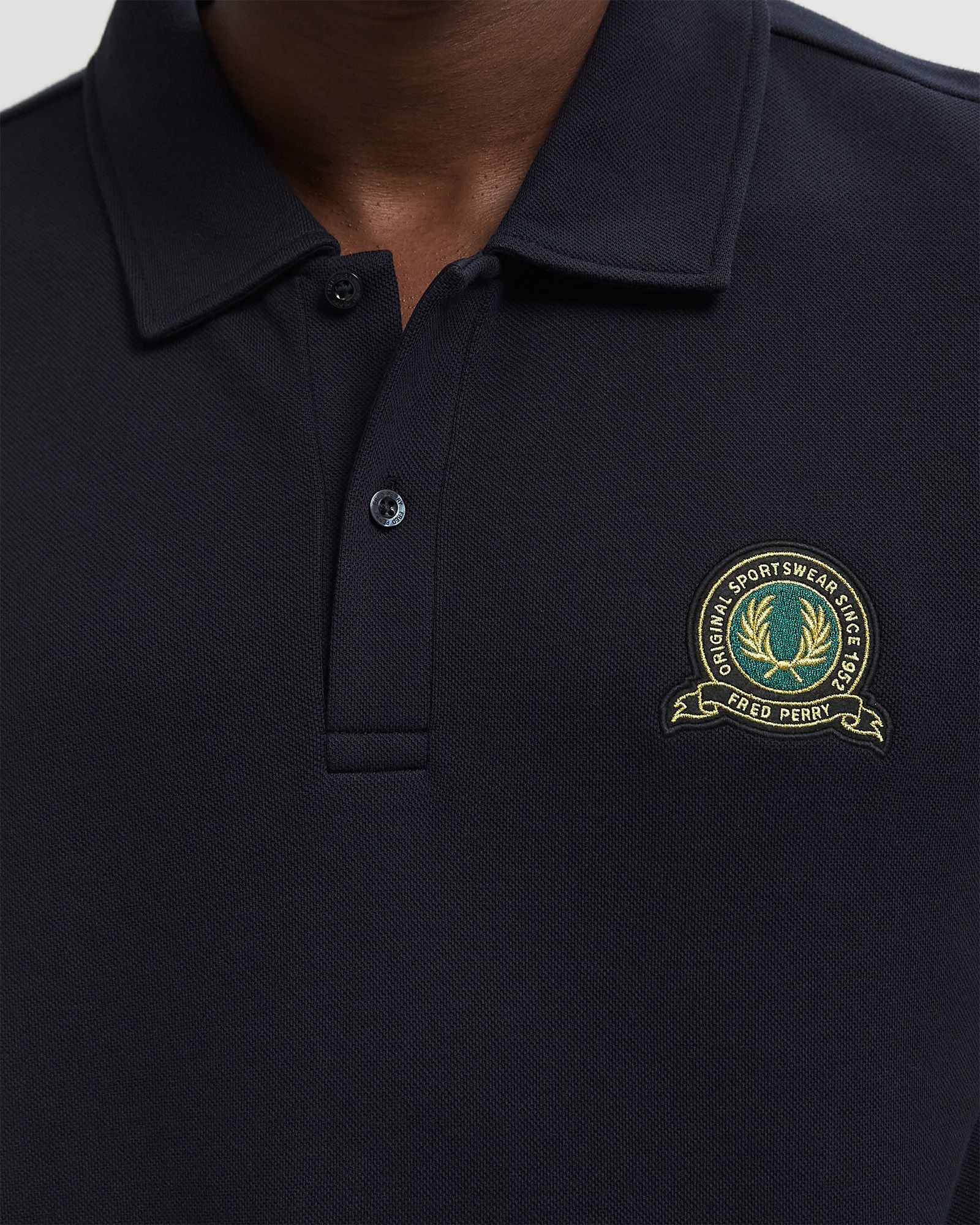 TENNIS BADGE COLLARED SWEATSHI