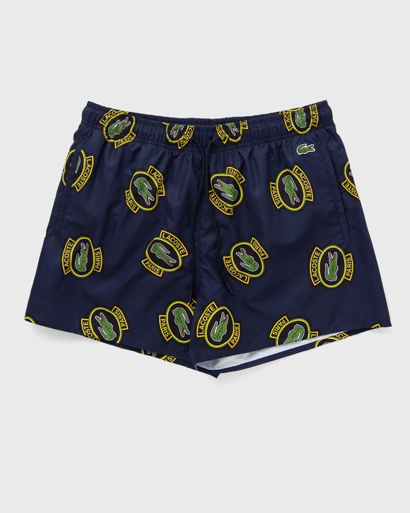 SHORT PRINTED SWIM TRUNKS