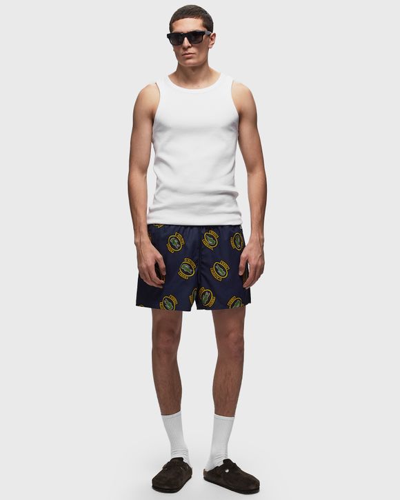 SHORT PRINTED SWIM TRUNKS