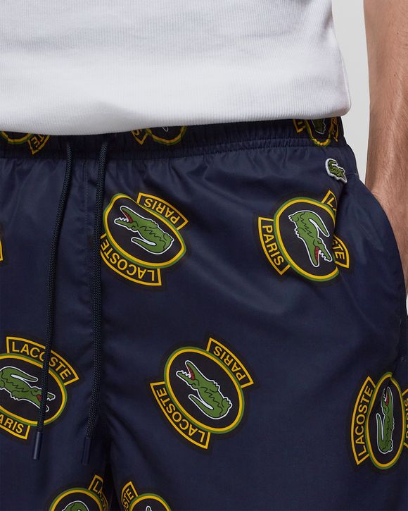 SHORT PRINTED SWIM TRUNKS