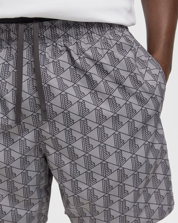 Mid Length Monogram Print Swim Trunks