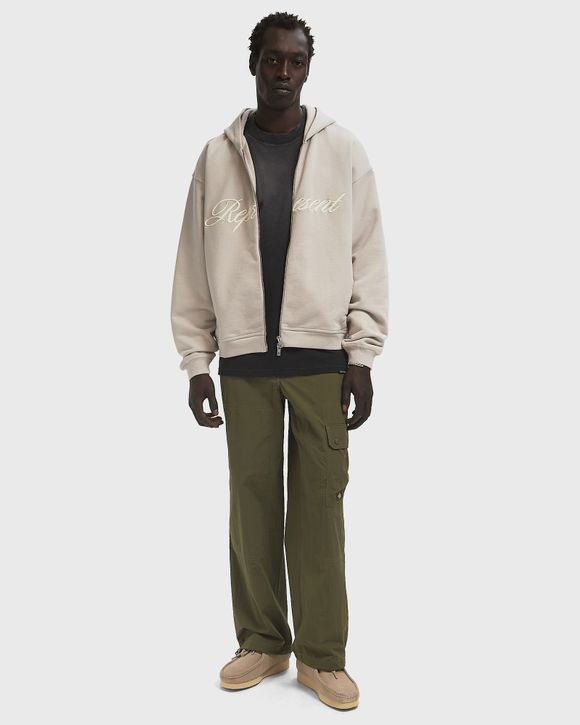 パーカー・フーディ REPRESENT SS25 (MLM4372 020) Represent Script Logo Zip Hoodie Beige | BSTN Store