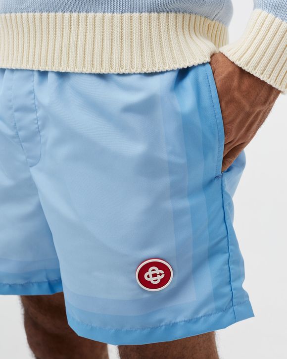 PRINTED SWIM TRUNKS