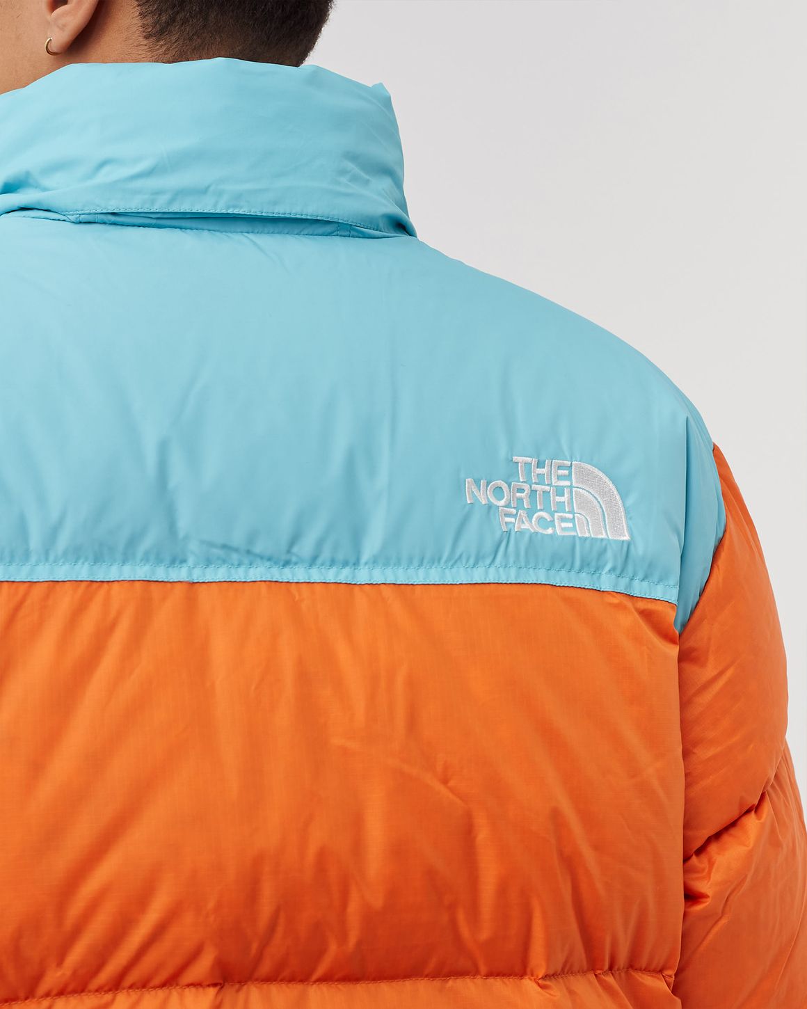 Nuptse jacket orange store