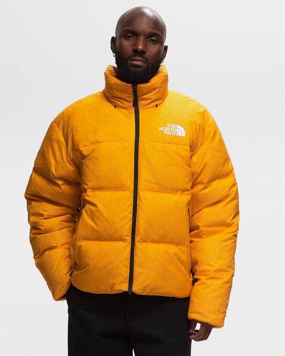 The north face store yellow nuptse