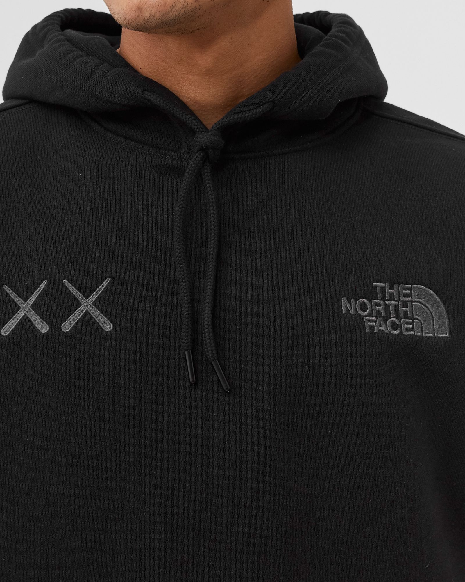 The North Face TNF X KAWS 'PROJECT X' HOODIE Black | BSTN Store
