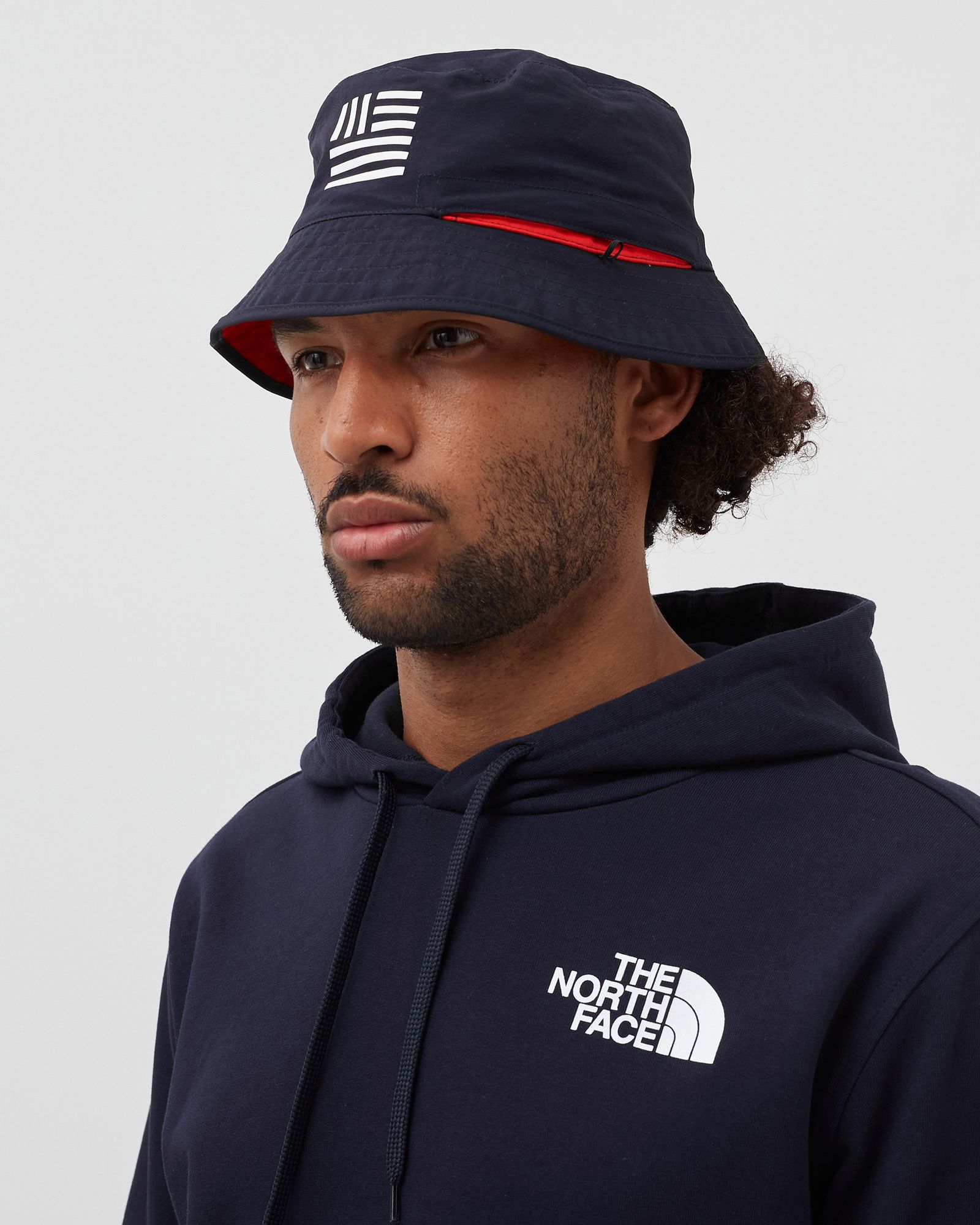 INTERNATIONAL COLLECTION REVERSIBLE SPECTATOR BUCKET HAT