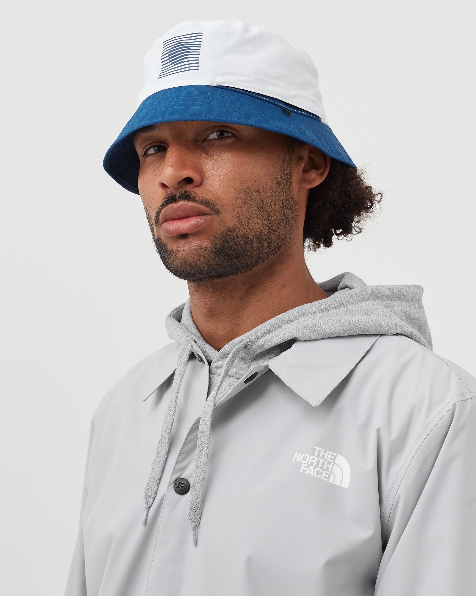 INTERNATIONAL COLLECTION REVERSIBLE SPECTATOR BUCKET HAT