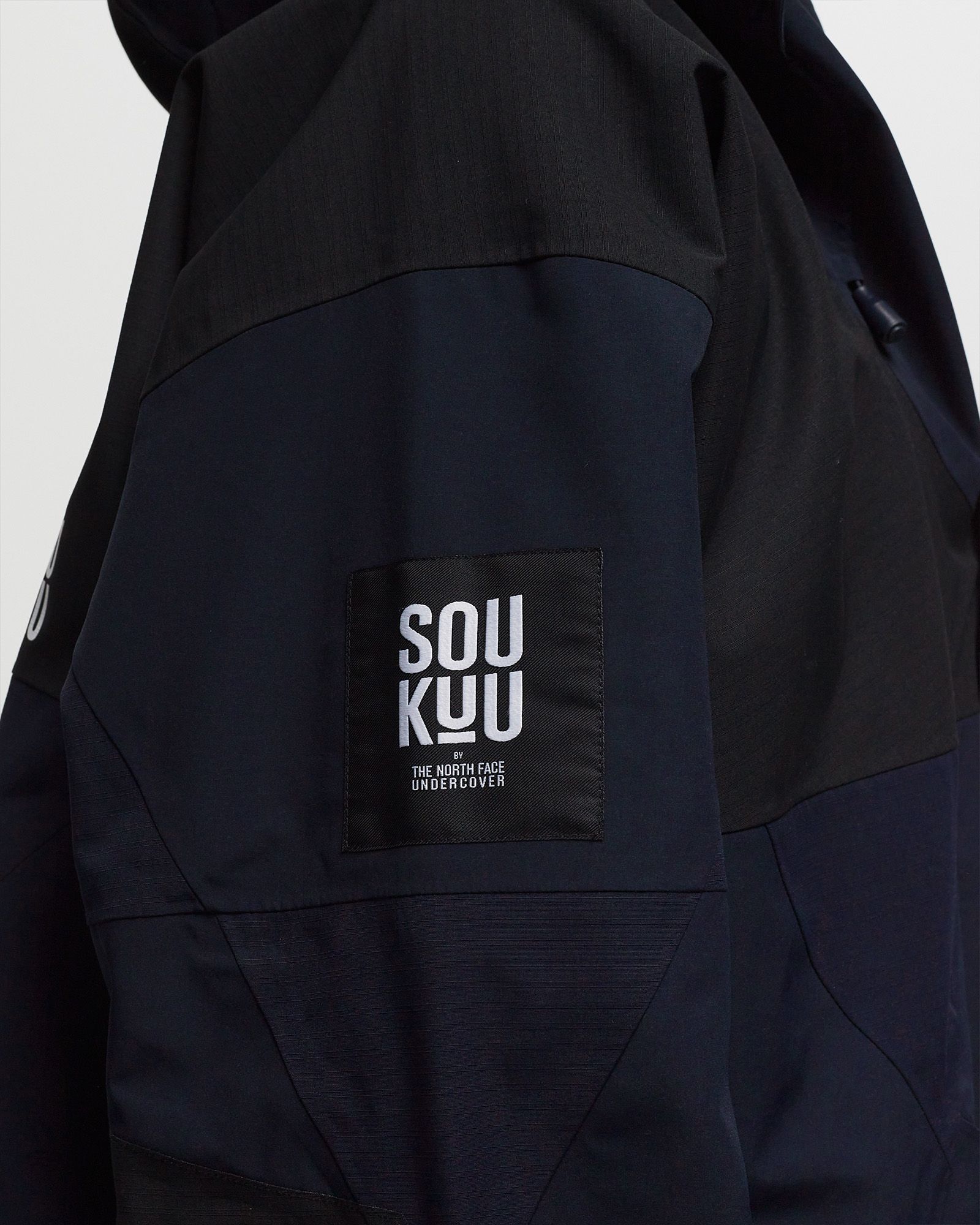 X UNDERCOVER GEODESIC SHELL JACKET