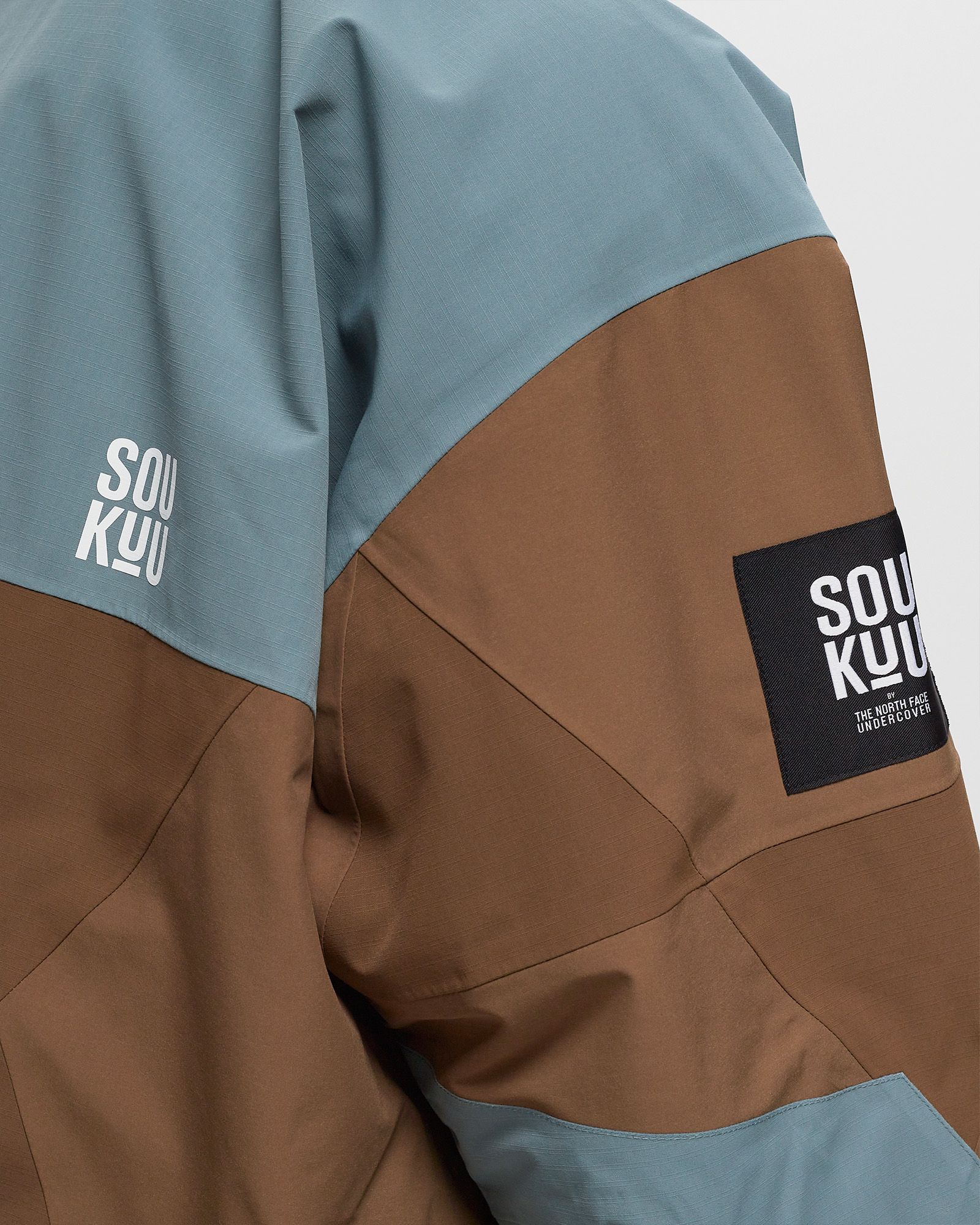 X UNDERCOVER GEODESIC SHELL JACKET