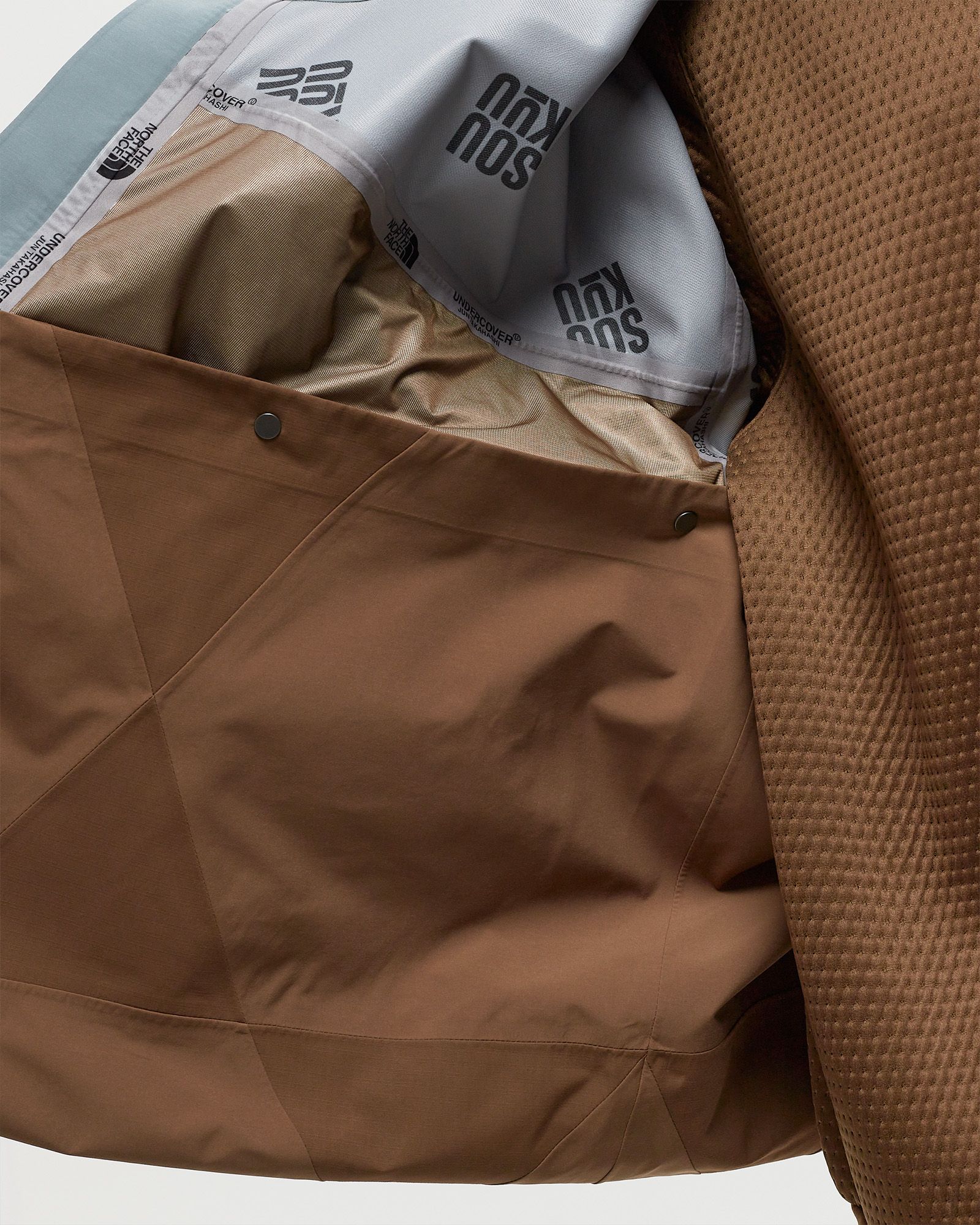 X UNDERCOVER GEODESIC SHELL JACKET