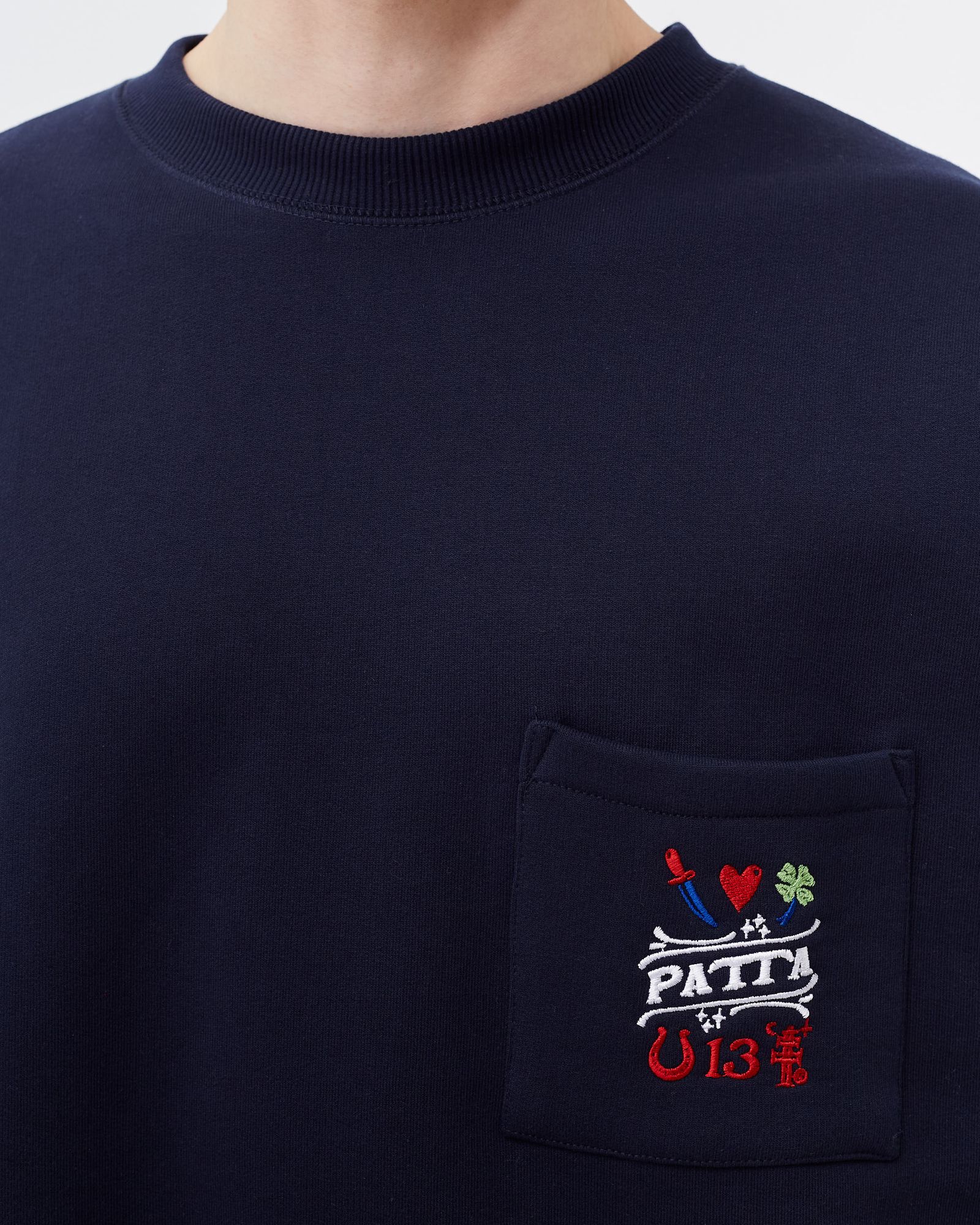 Lucky Charm Pocket Crewneck Sweater