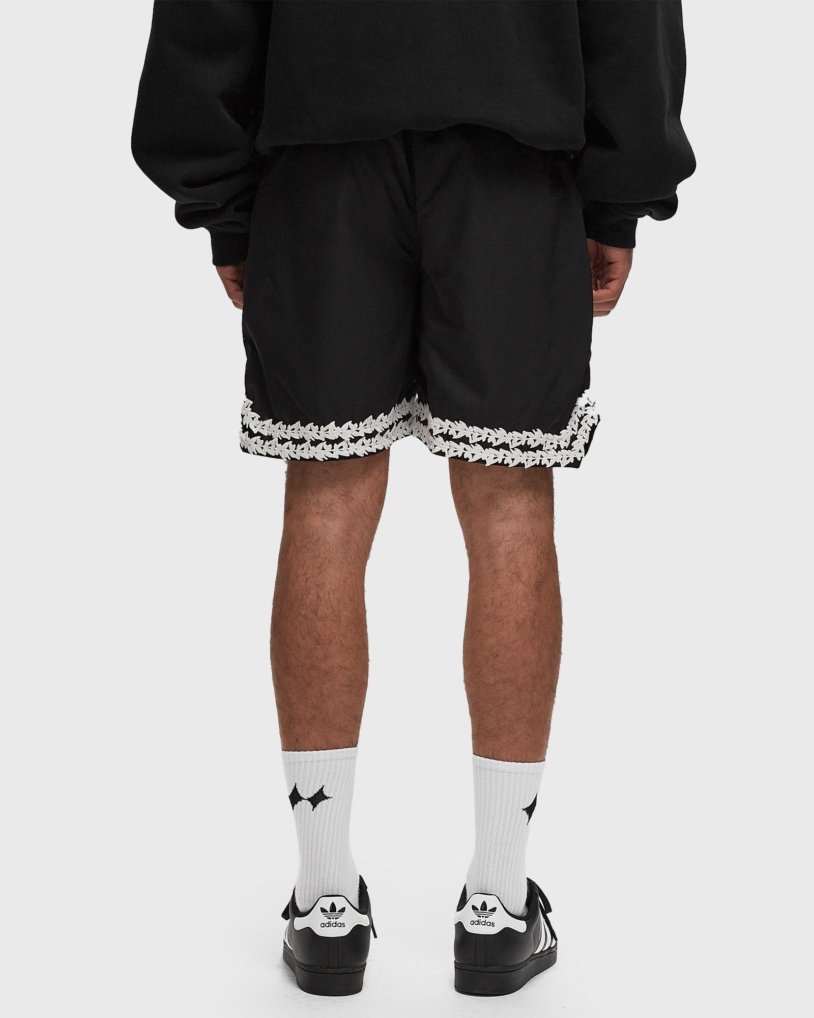 MESH SHORTS WITH KNITTED OLIVES