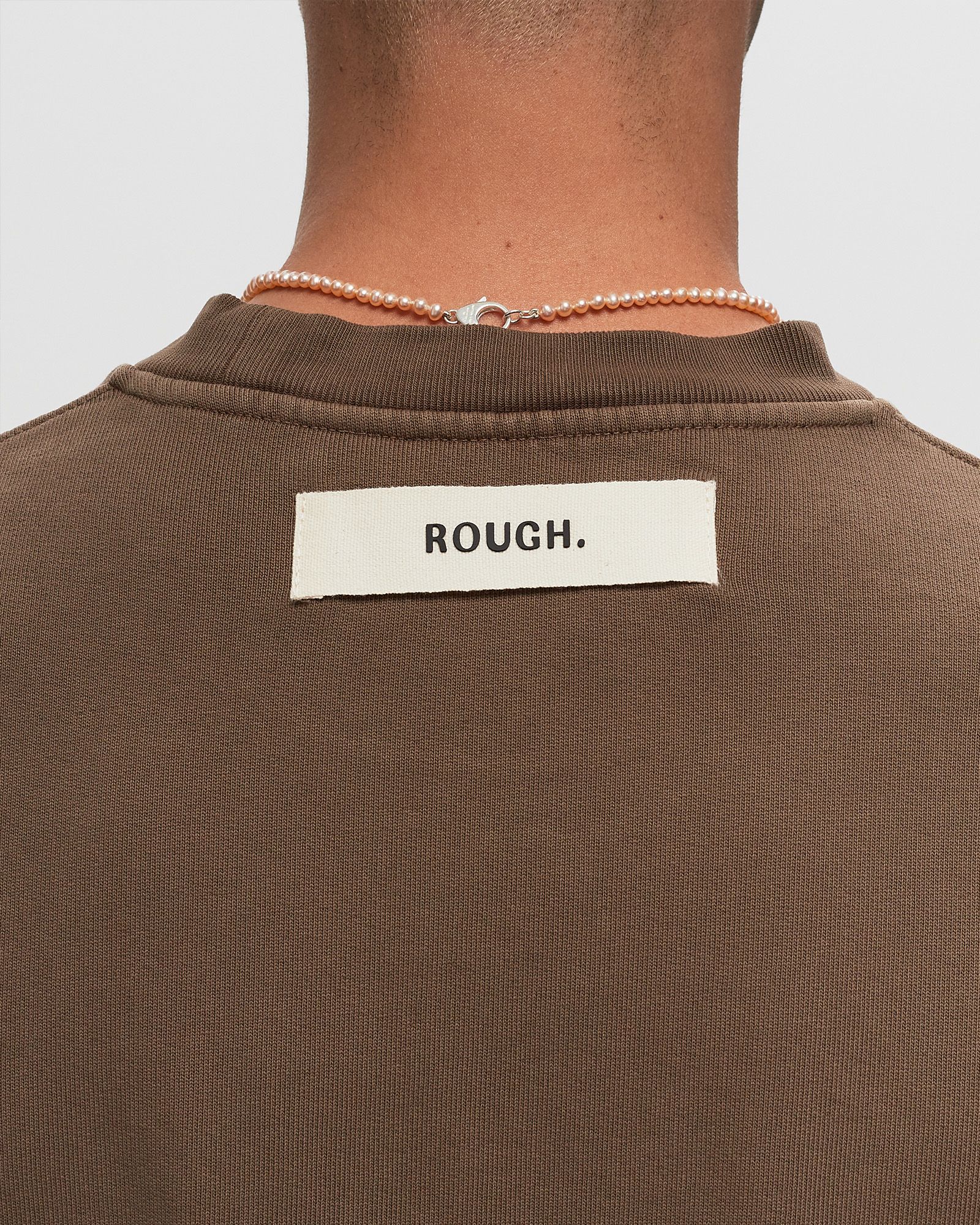 FLORAL EMBLEM SWEATER