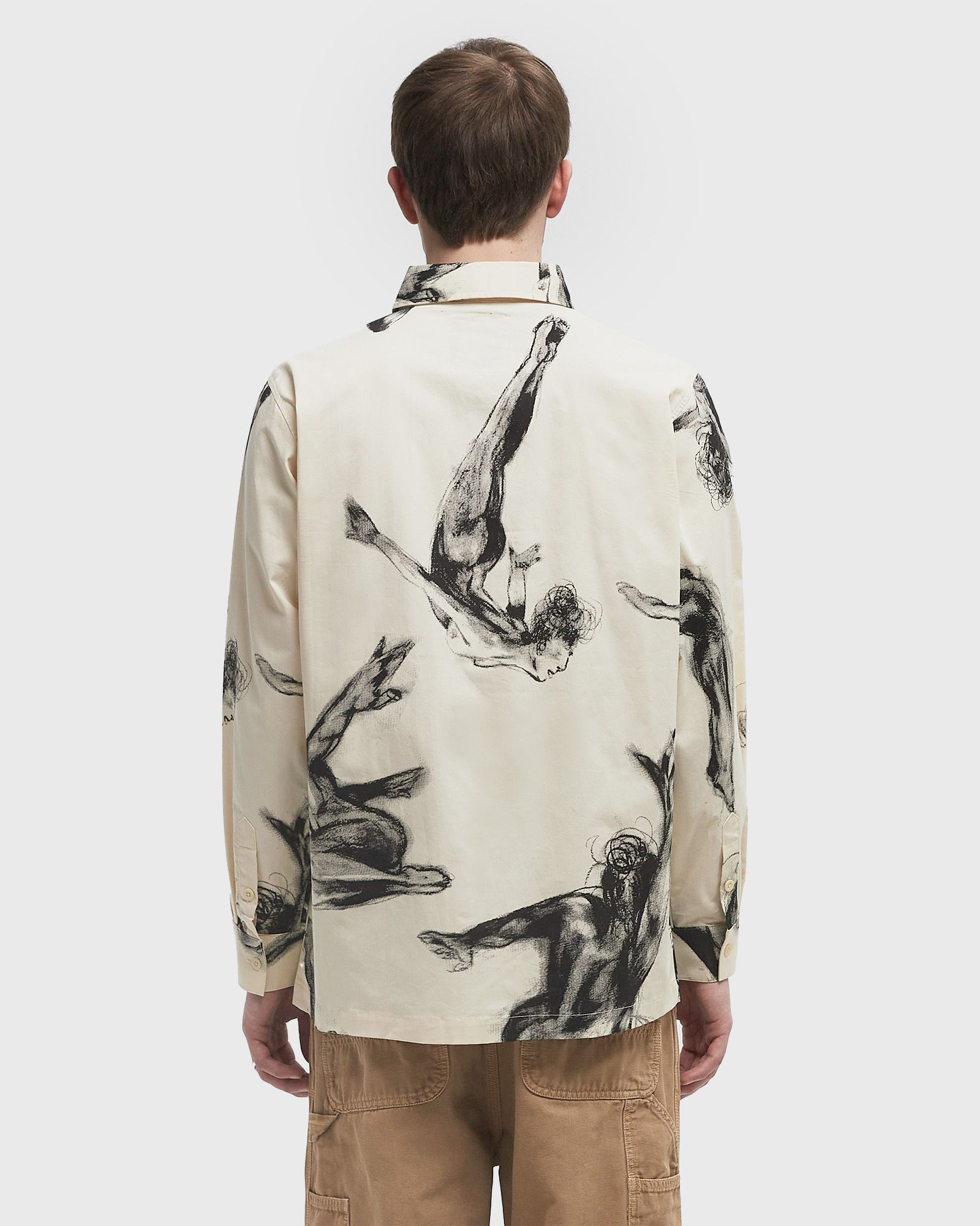 TRAPEZE PERFORMER BUTTON UP