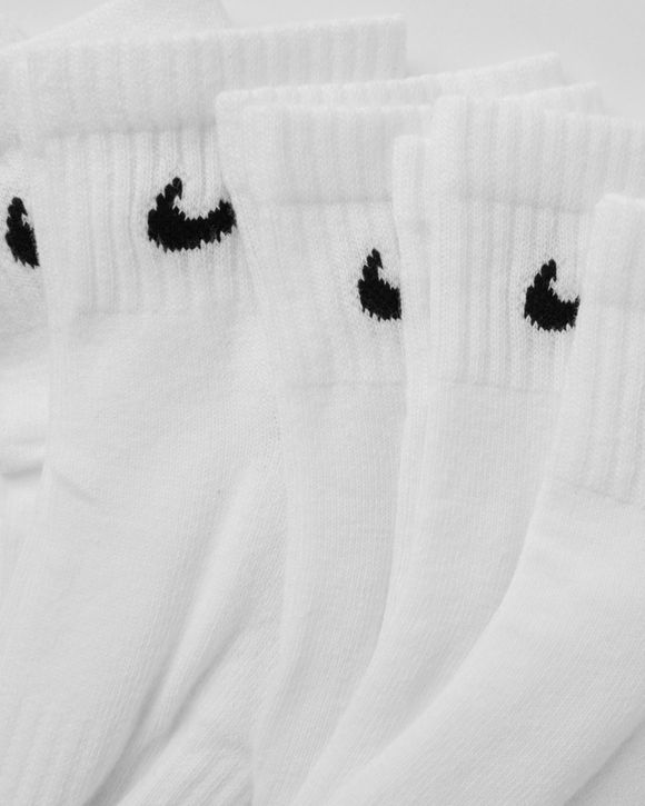 white nike socks with black swoosh