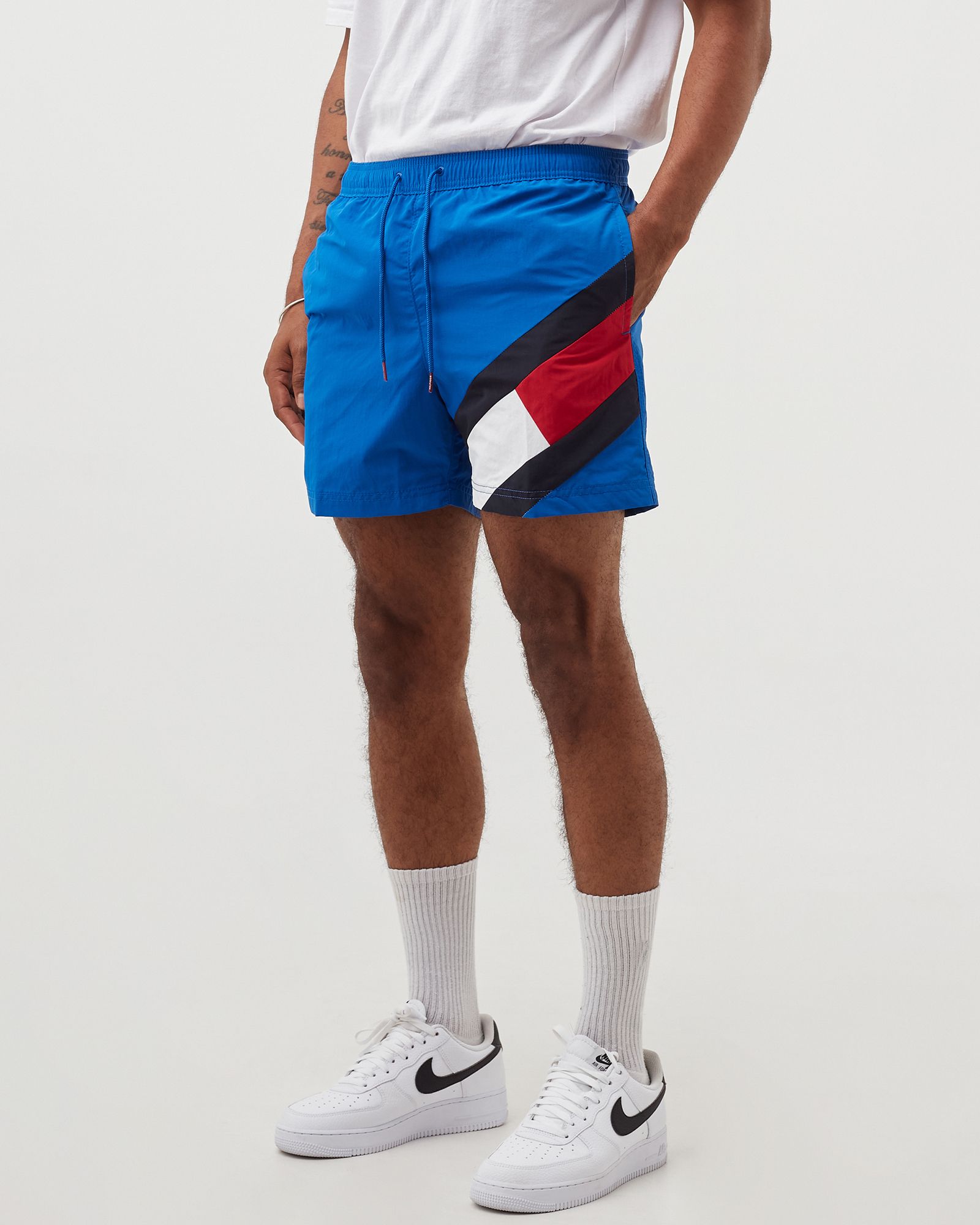 COLOUR-BLOCKED SLIM FIT MID LENGTH SWIM SHORTS