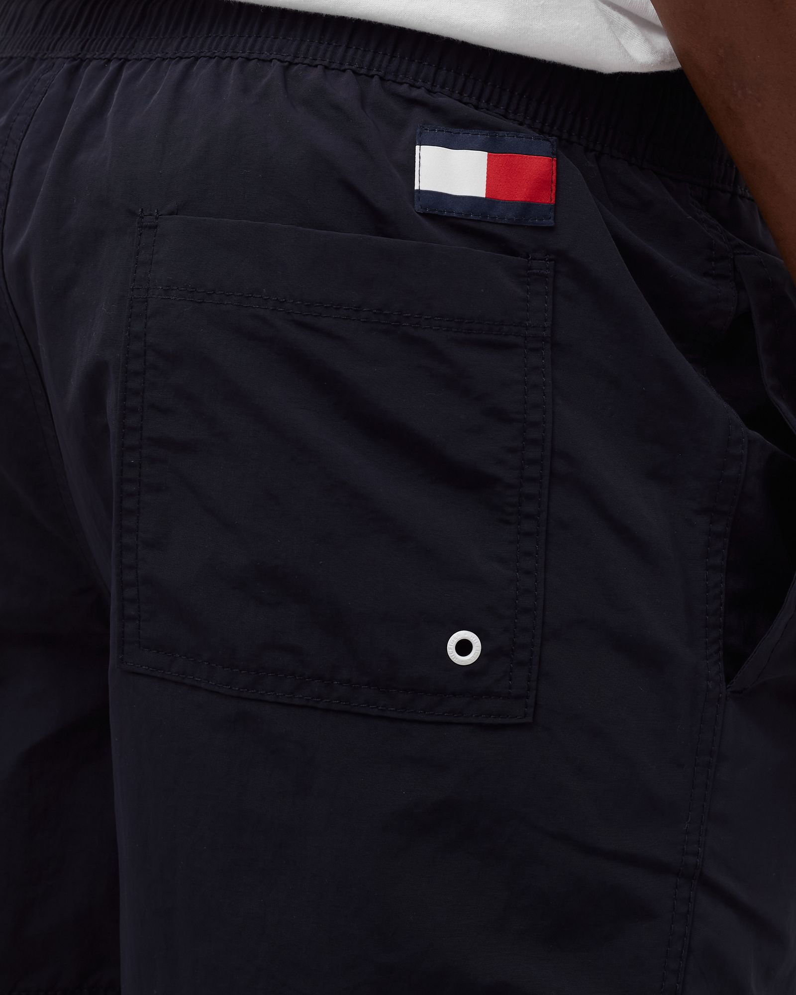 COLOUR-BLOCKED SLIM FIT MID LENGTH SWIM SHORTS