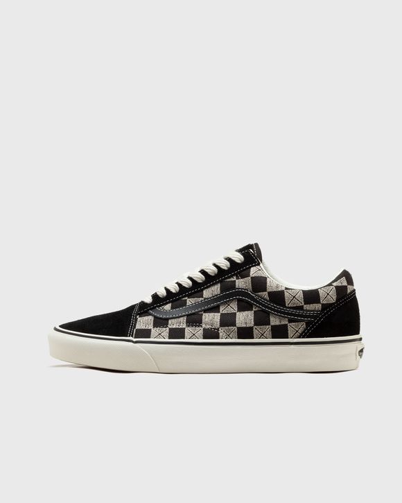 Black and checkerboard store old skool vans