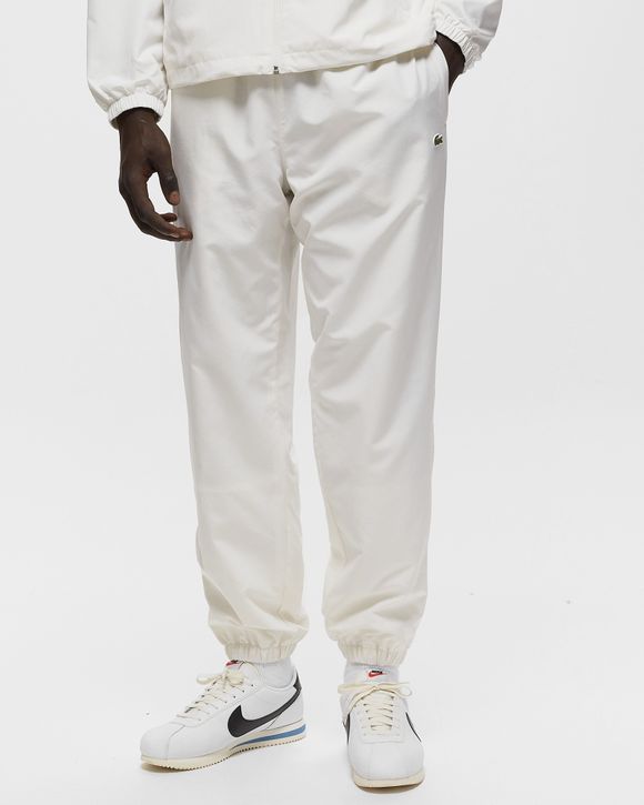 White lacoste track clearance pants