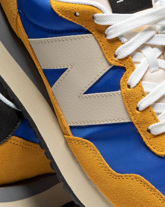 New balance discount jaune et bleu