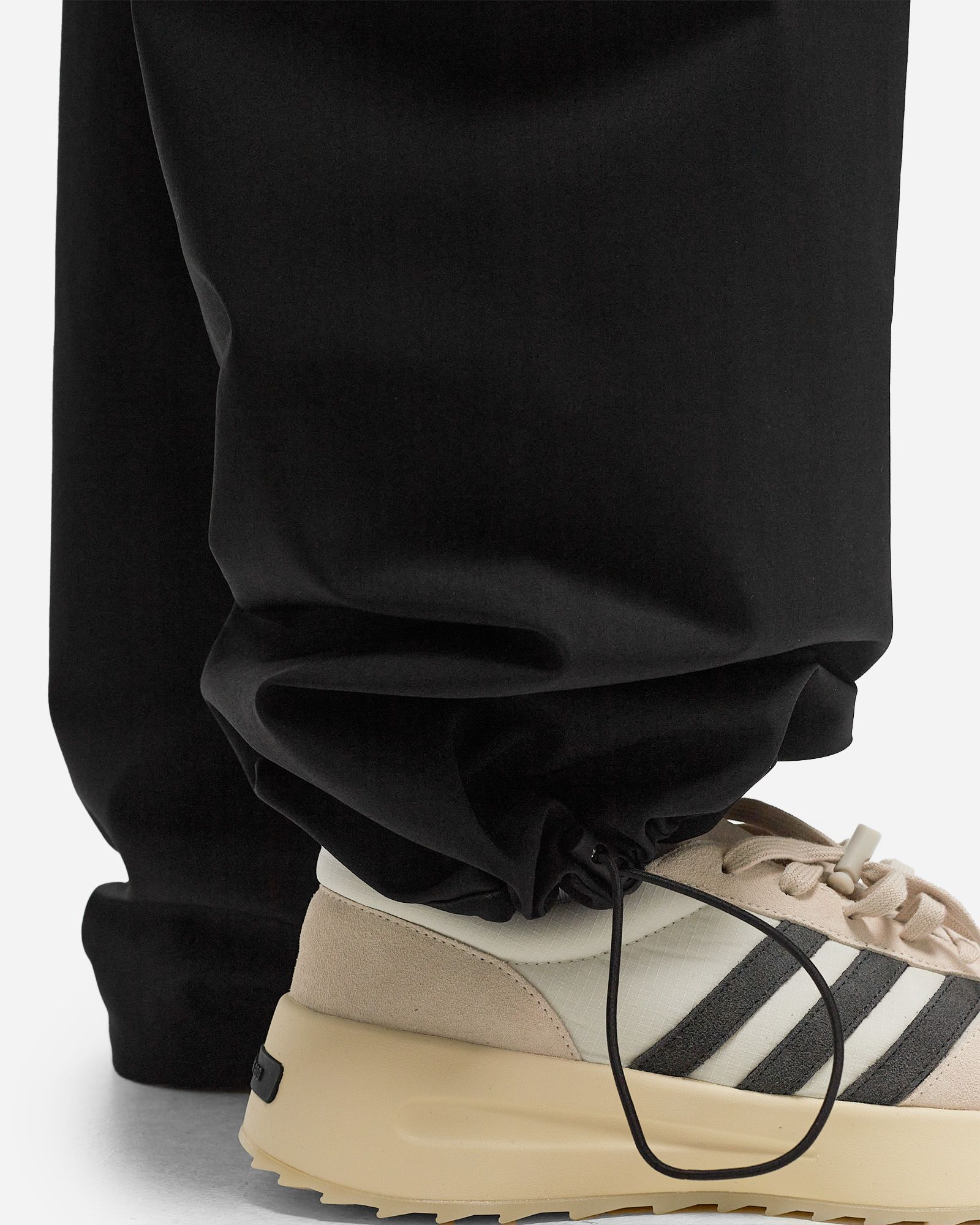 Fear of God Essentials BONDED NYLON FIELD PANT Black | BSTN Store