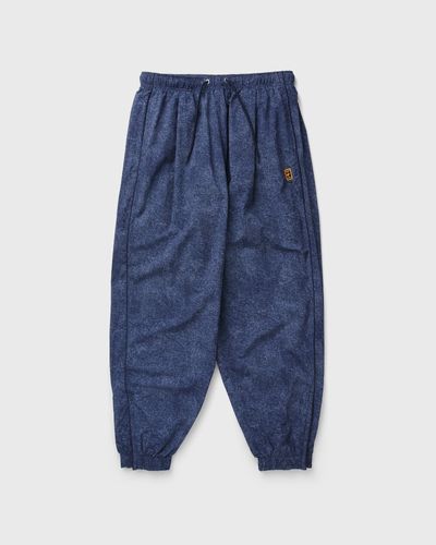 Nike CLUB RULES TRK PANT AOP, blue