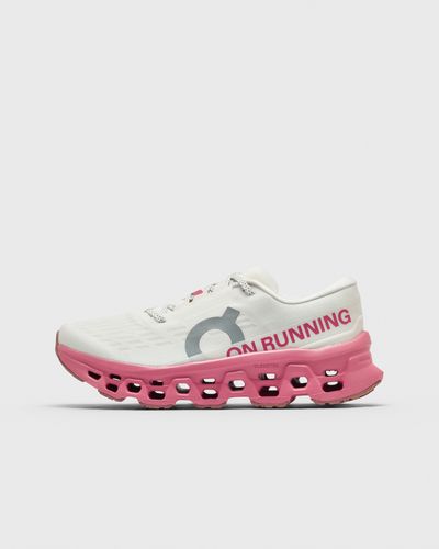 On Cloudmonster 3, pink|white